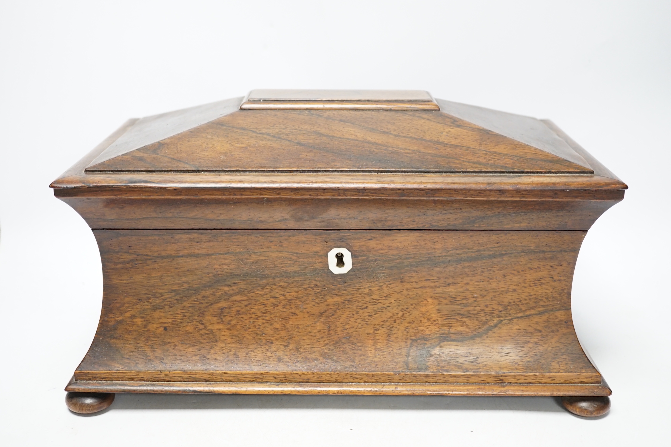 A William IV rosewood sarcophagus shaped tea caddy, 34cm wide CITES Submission reference QKX14SVV